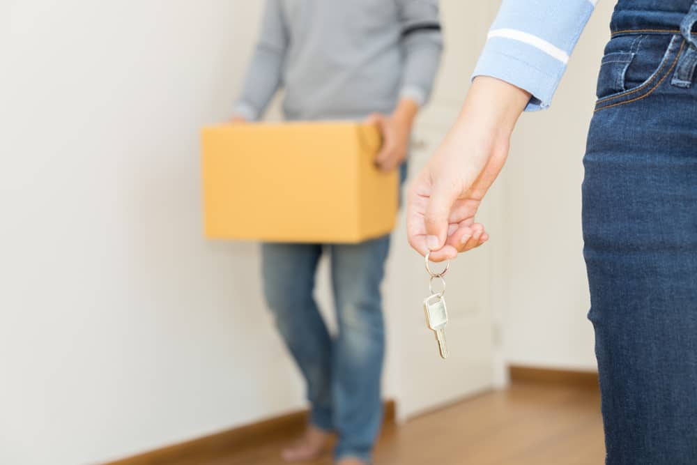 Woman Holds Key